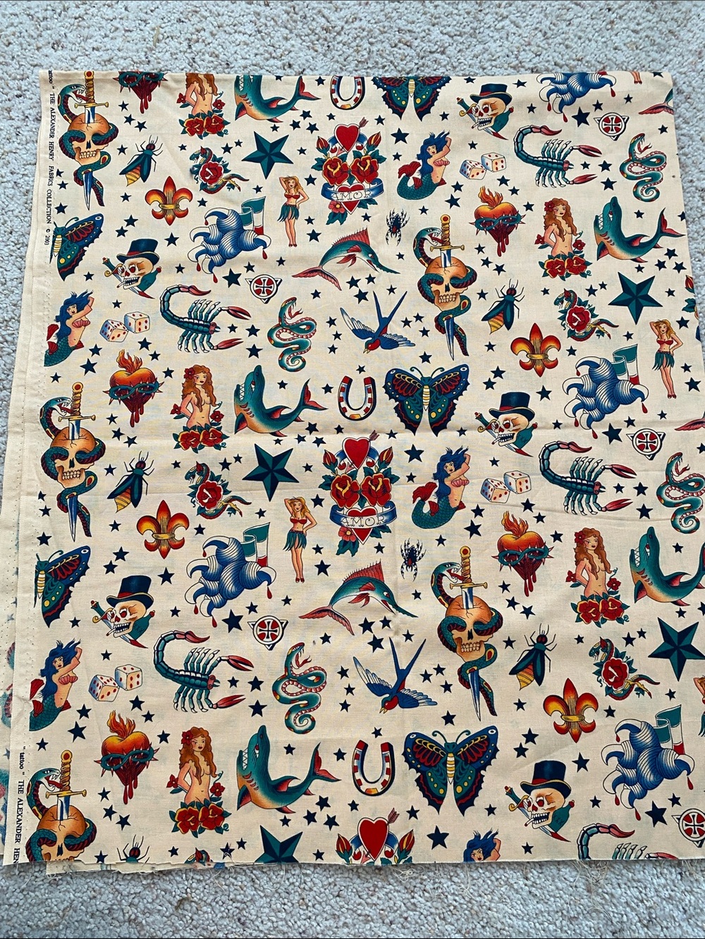 “Tattoo” Alexander Henry Fabric Collection. OOP. 2003. Cream Background.